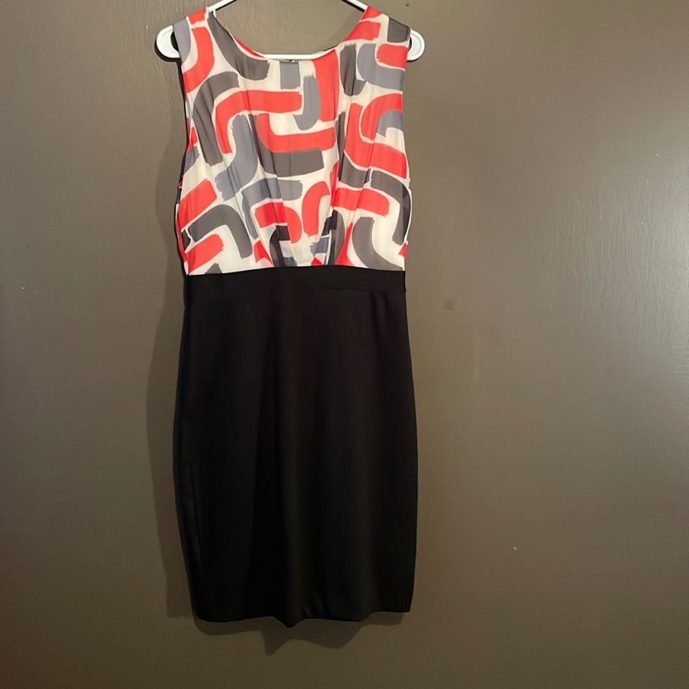 Dress ready to wear to an evening function!  Fitted and classy look.